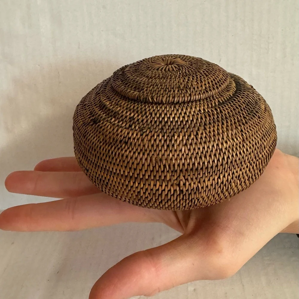 Vintage finely woven petite boho basket with lid.Amazing craftsmanship.